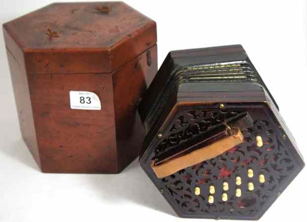 Appraisal: th Century Key Lachenal Co Concertina in Octaganal Mahogany Case