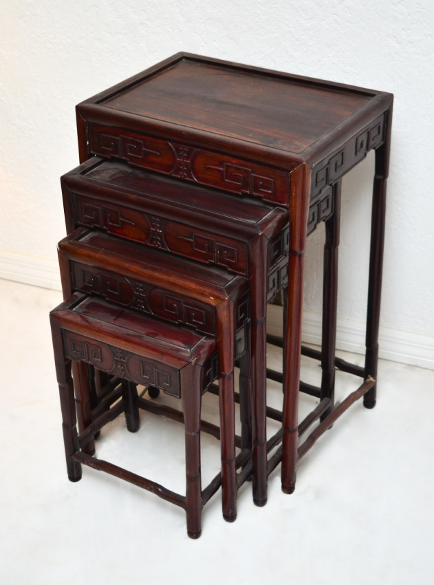 Appraisal: CHINESE CARVED ROSEWOOD NEST OF TABLES graduating nest of stacking