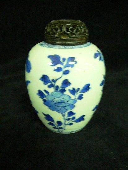 Appraisal: A K'ang Hsi blue and white ginger jar painted chrysanthemums