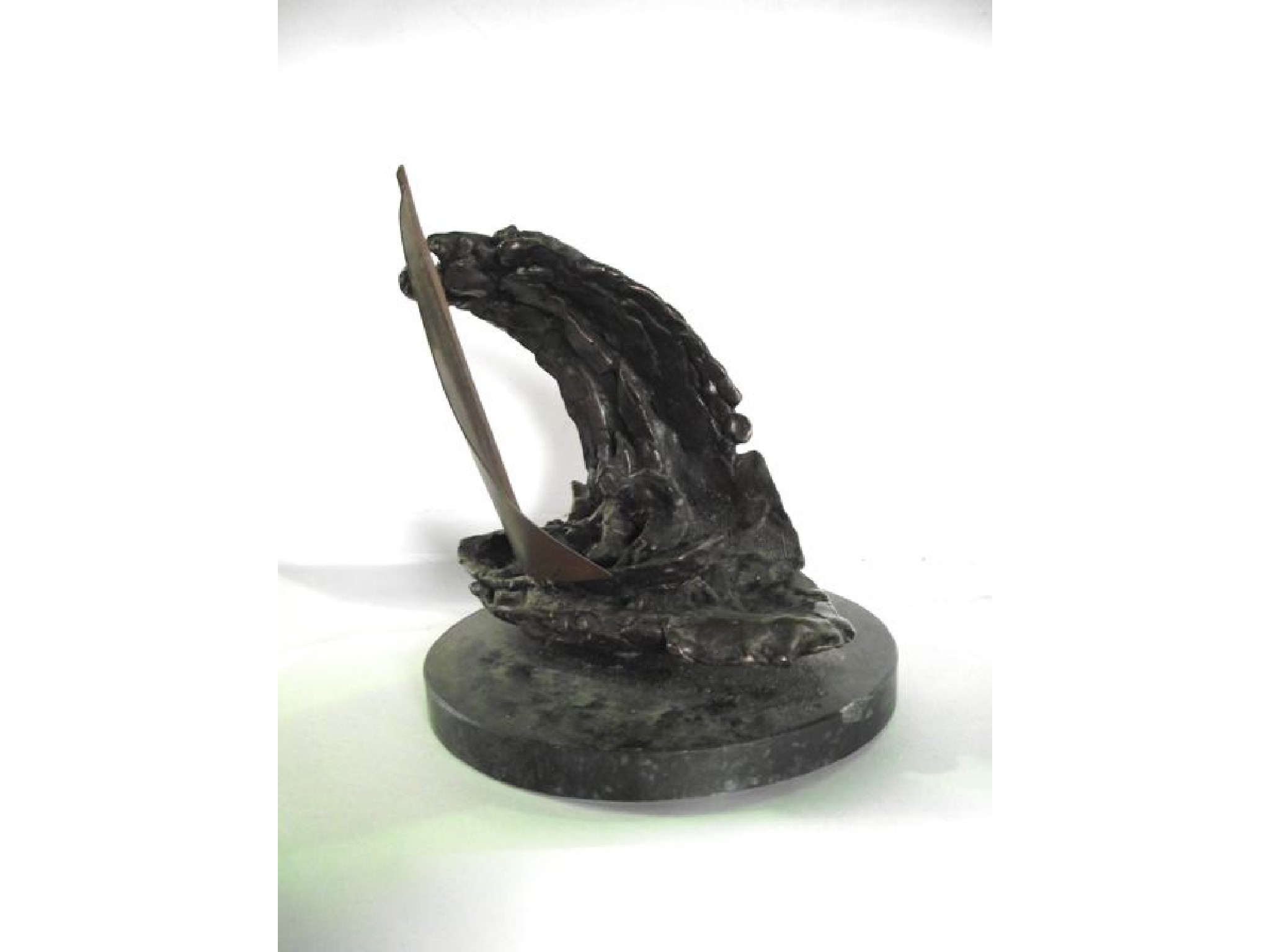 Appraisal: A crude bronze sculpture depicting a pair of figures in