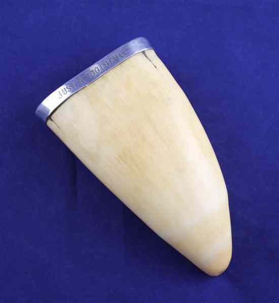 Appraisal: A Victorian silver mounted whale's tooth inscribed ''Just a toothfull''