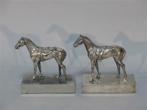 Appraisal: PAIR OF SHEFFIELD PLATE HORSE-FORM BOOK ENDS Each beast cast