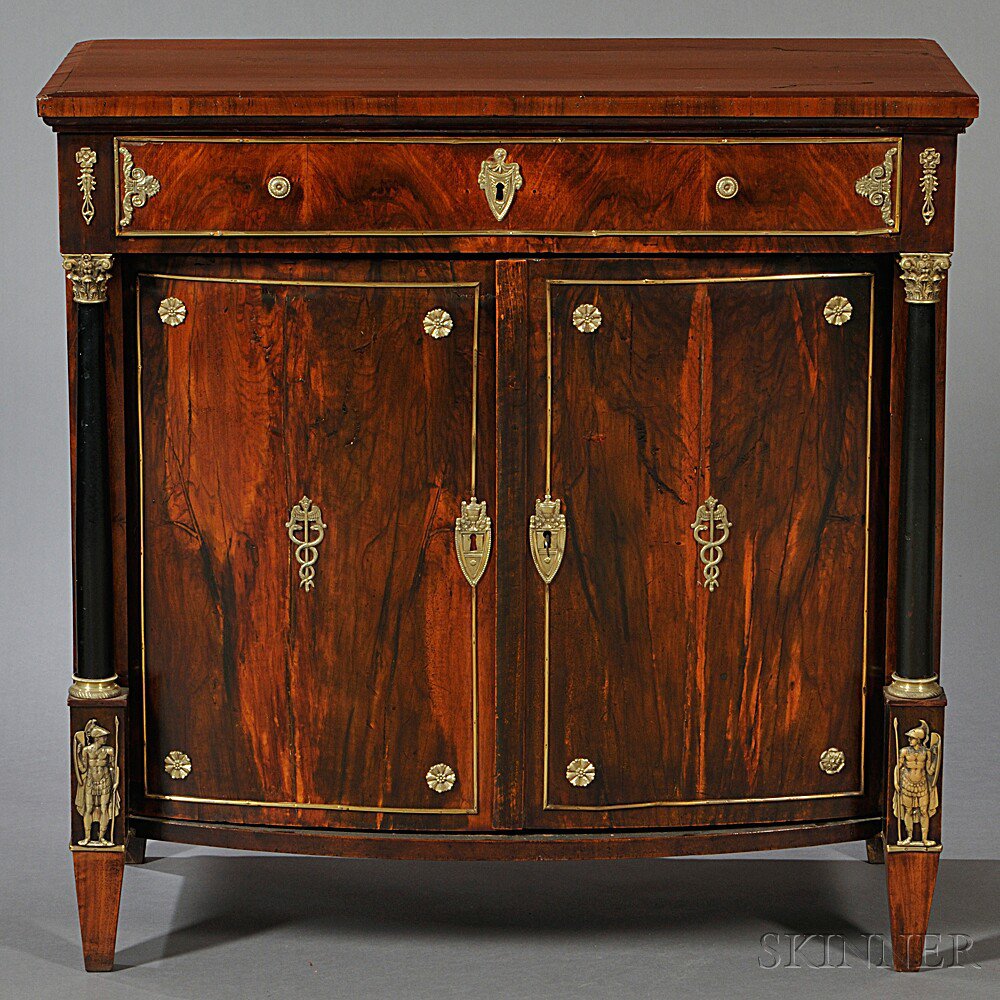 Appraisal: French Empire Gilt-bronze-mounted and Rosewood-veneered Commode with a single frieze