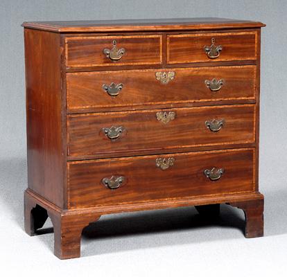 Appraisal: Georgian mahogany five-drawer chest satinwood banded veneered top dovetailed drawers