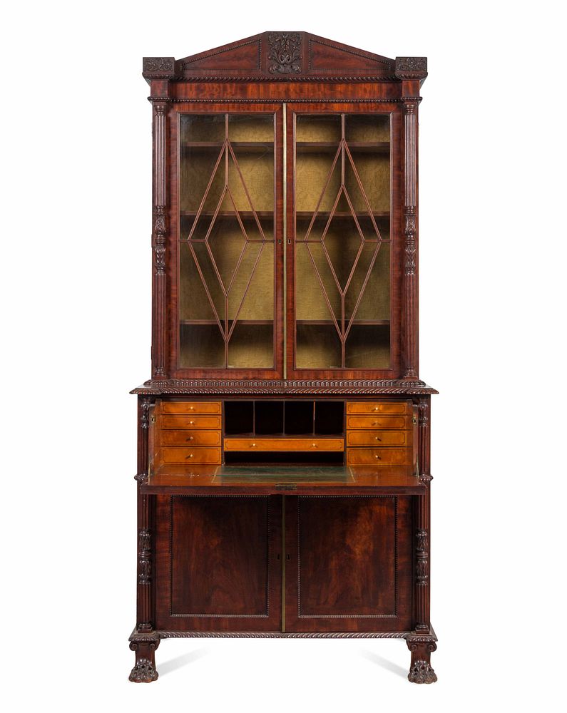 Appraisal: A Regency Carved and Figured Mahogany Secretary Bookcase A Regency