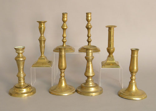 Appraisal: Three pair of th th c brass candlesticks together with