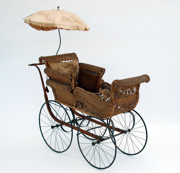 Appraisal: Wicker baby carriage Bentwood frame with metal suspension and spoked