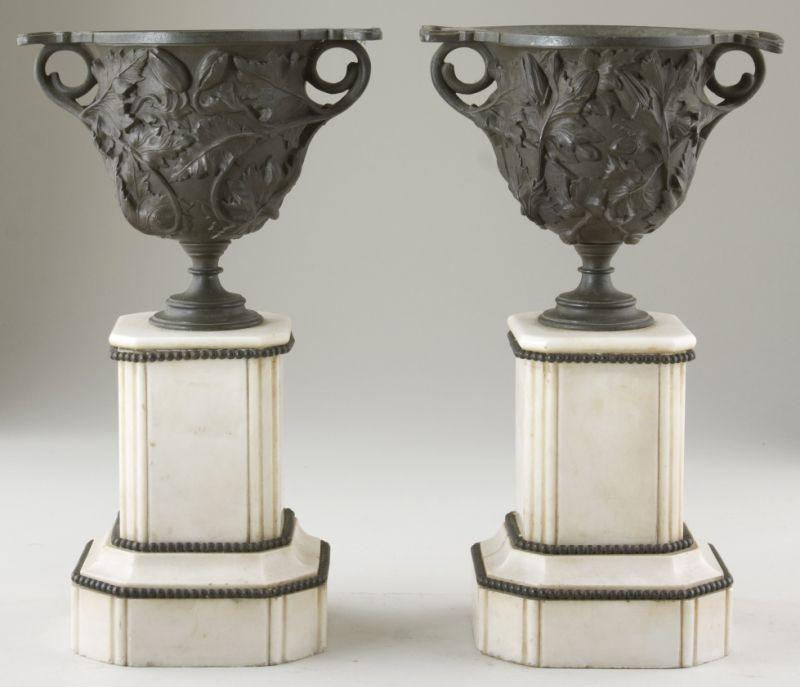 Appraisal: Pair of Miniature Cast Iron Urns th century likely used