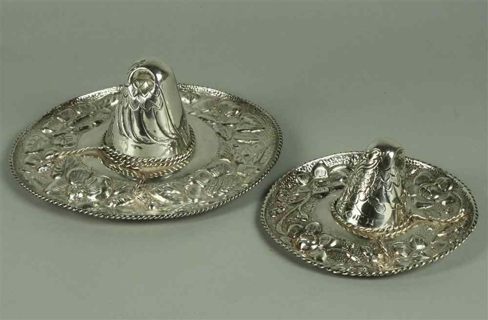 Appraisal: TWO MEXICAN SILVER ASHTRAYS FORMED AS SOMBREROS dia in and