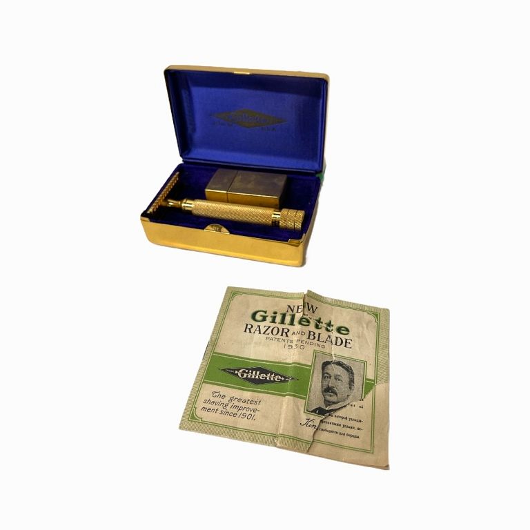 Appraisal: Gillette Razor Set Golden box golden razor and golden blades