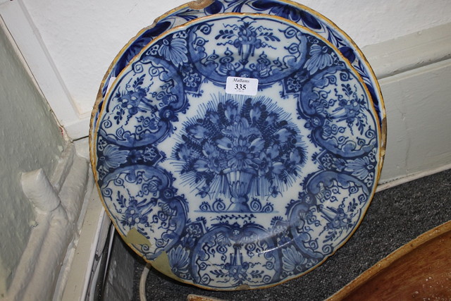 Appraisal: A DELFT BLUE CHARGER with simple flower decoration maker's B