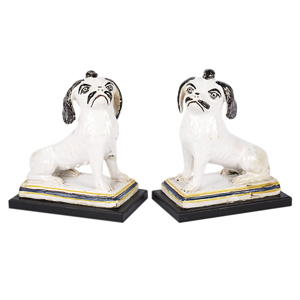 Appraisal: Pair of Italian Maiolica Figures of Dogs th Century Each