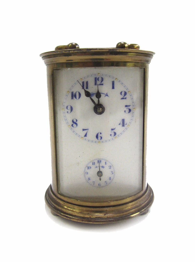 Appraisal: A gilt brass cased carriage clock of cylindrical form early