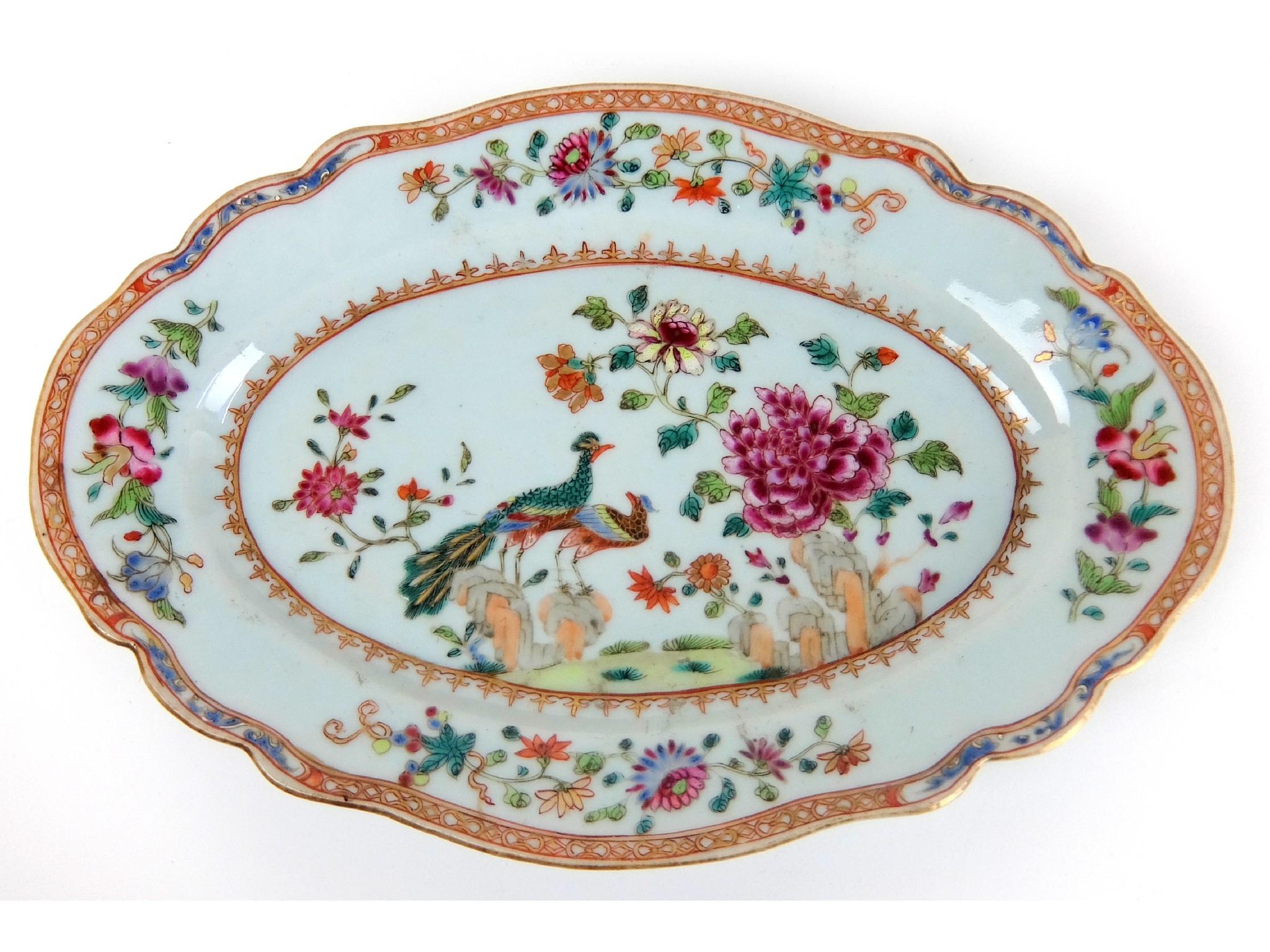 Appraisal: A Chinese export famille rose peacock and hen pattern oval