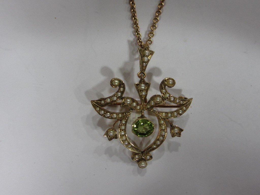 Appraisal: An Edwardian ct gold peridot and seed pearl set pendant