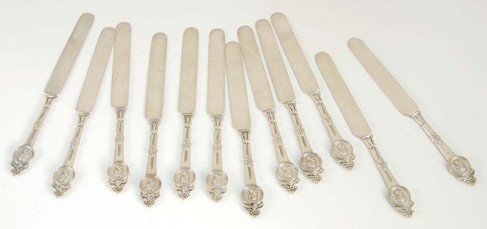 Appraisal: TWELVE STERLING SILVER FLAT-HANDLED KNIVES By Gorham in the Medallion