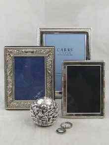 Appraisal: Two hallmarked silver photo frames and another tests silver together