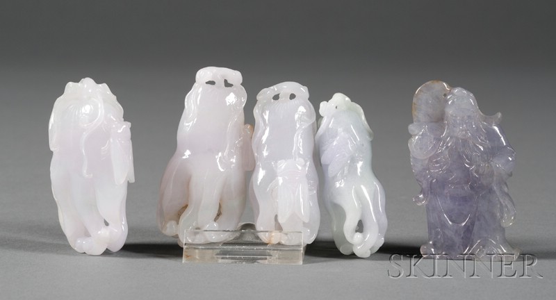 Appraisal: Five Jade Pendants a highly translucent deep lavender figure of