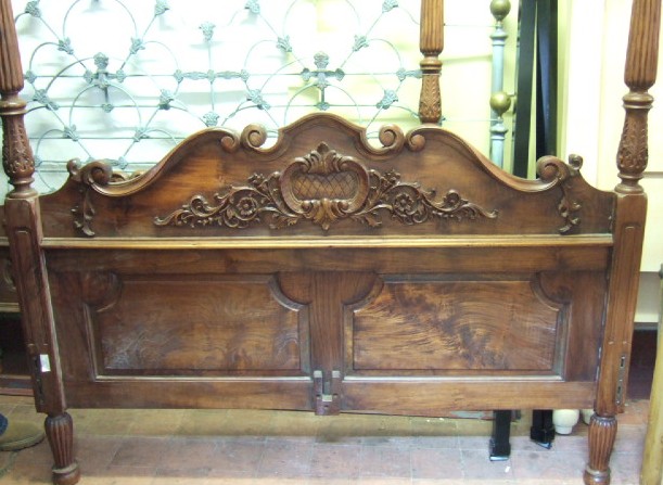 Appraisal: A th century carved hardwood four poster bed the head