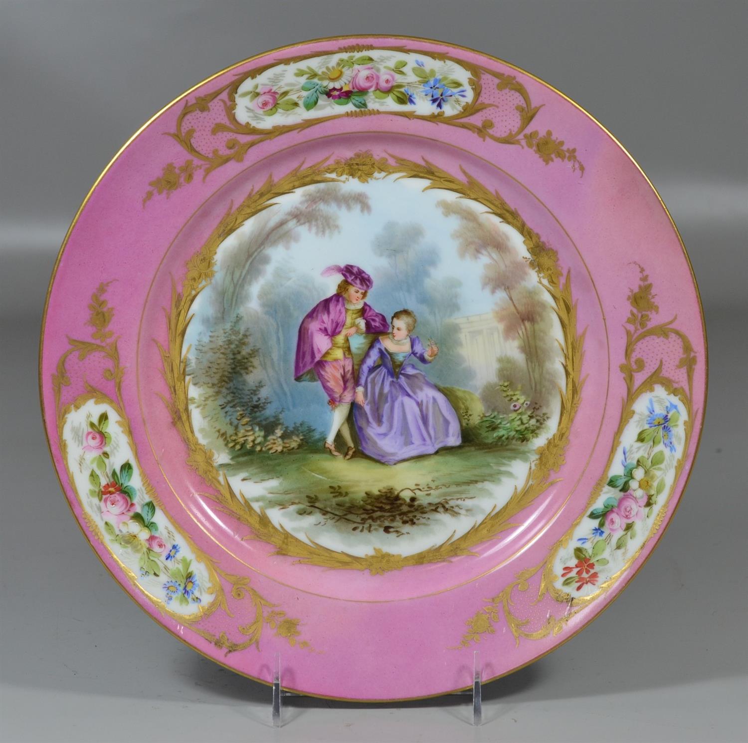 Appraisal: Sevres-style porcelain charger pink border with gilt decoration and hand