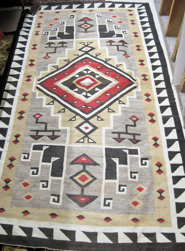 Appraisal: NAVAJO TWO GREY HILLS AREA RUG hand woven in an