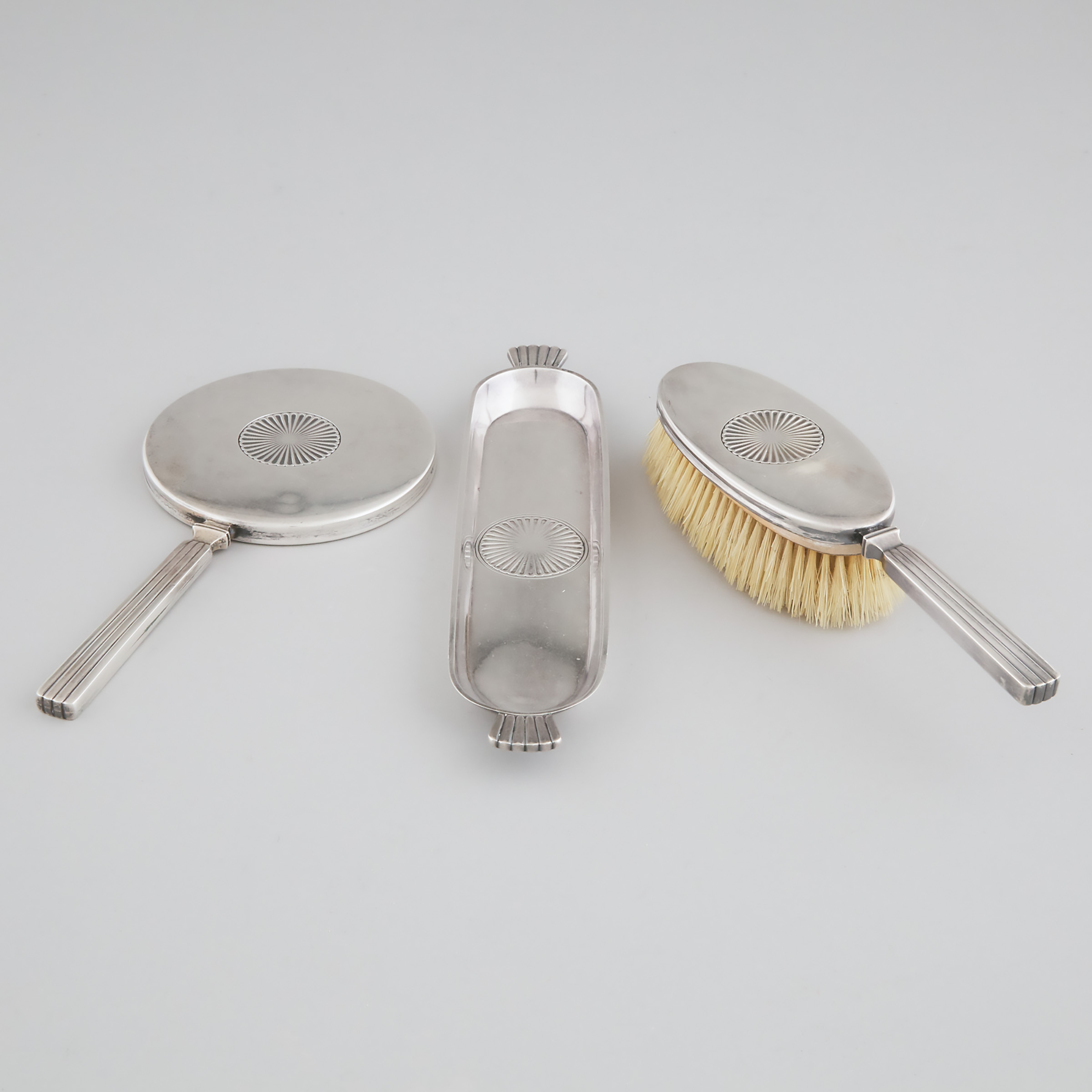 Appraisal: Danish Silver Mounted Hand Mirror Hair Brush and Tray Sigvard