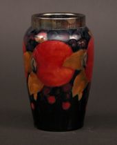 Appraisal: Moorcroft Pomegranate Vase The silver collar at top of this