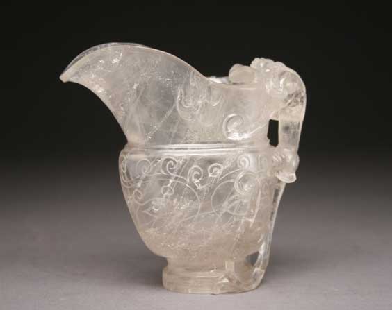 Appraisal: CARVED CRYSTAL LIBATION VESSEL Well carved Chinese rock crystal archaistic