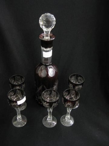 Appraisal: Ruby Cut-to-Clear Decanter Cordials pinwheel starburst design decanter - cordials