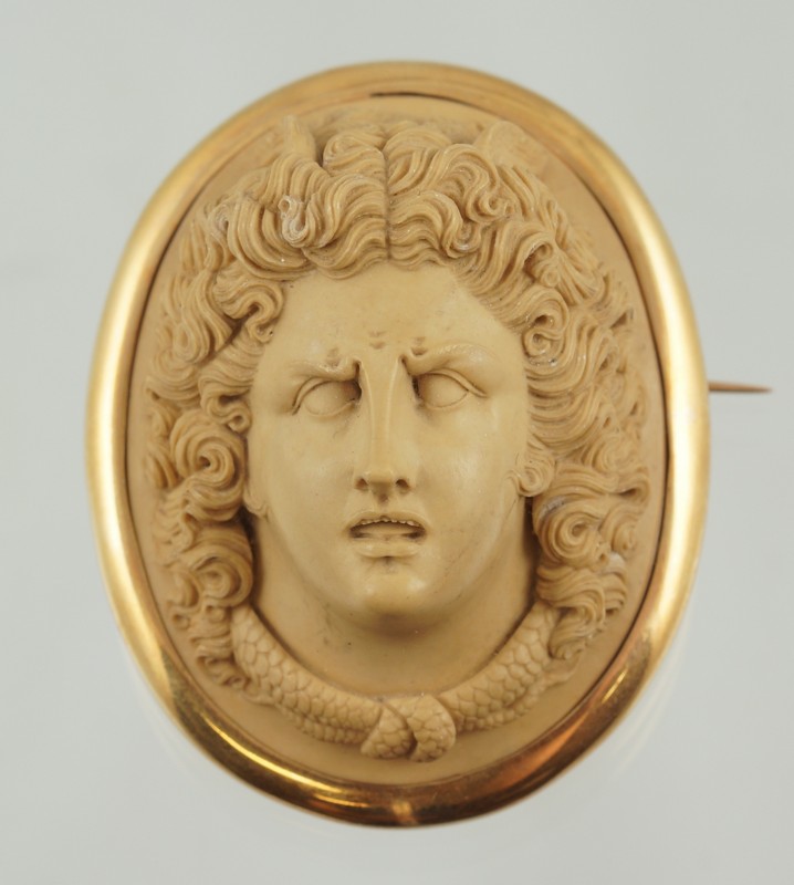 Appraisal: Carved lava cameo portrait bust pin Mercury with winged hair