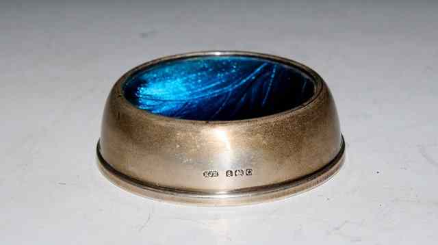 Appraisal: A SILVER AND ENAMEL CIRCULAR PIN TRAY concave base enamelled