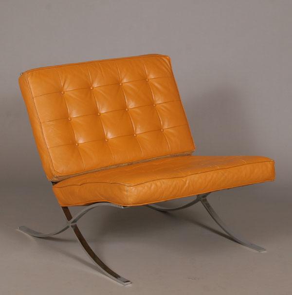 Appraisal: Barcelona chair chromed steel with caramel tufted leather cushions H