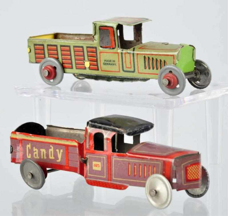 Appraisal: Lot of Tin Litho Truck Penny Toys Includes one marked