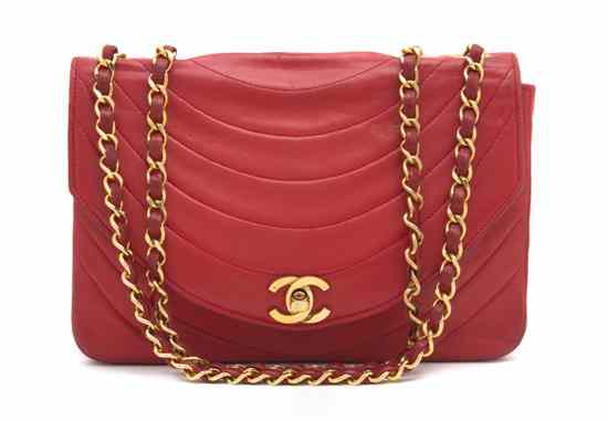 Appraisal: A Chanel Red Leather Bag with a chainlink strap Stamped