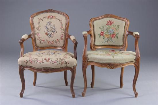 Appraisal: PAIR LOUIS XV STYLE FAUTEUILS EN CABRIOLE th century fruitwood