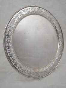 Appraisal: A circular silver salver with pierced border hallmarked Sheffield approx