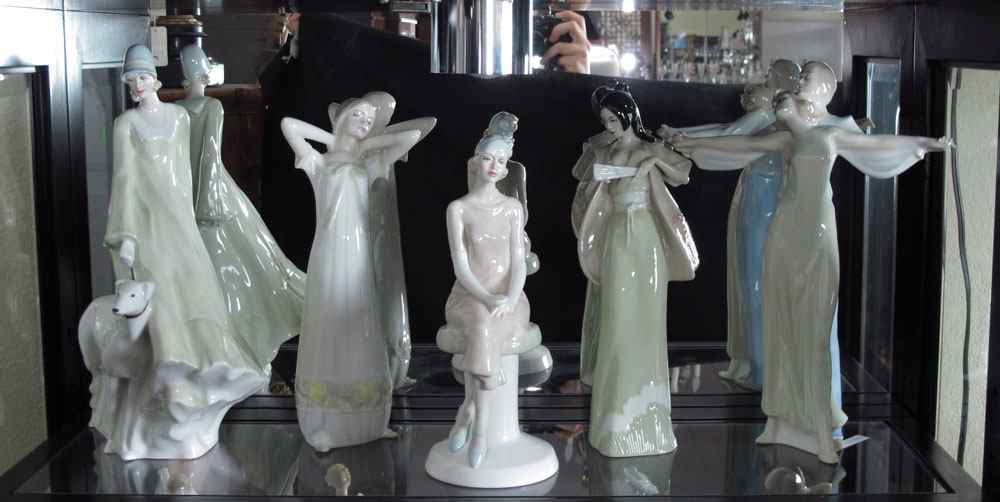 Appraisal: ROYAL DOULTON FIGURINES FROM THE REFLECTIONS SERIES ''Strolling'' HN ''