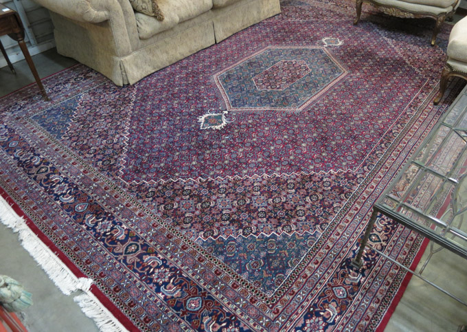 Appraisal: HAND KNOTTED ORIENTAL CARPET Indo-Bijar concentric hexagonal reserves covered in