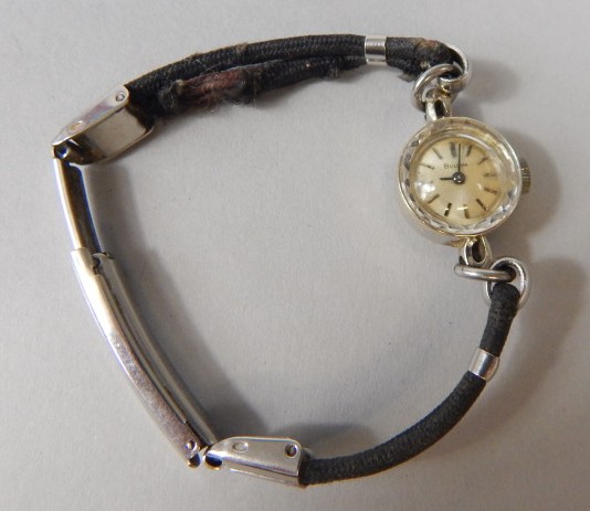 Appraisal: A Bulova ladies cocktail watch in a white metal case