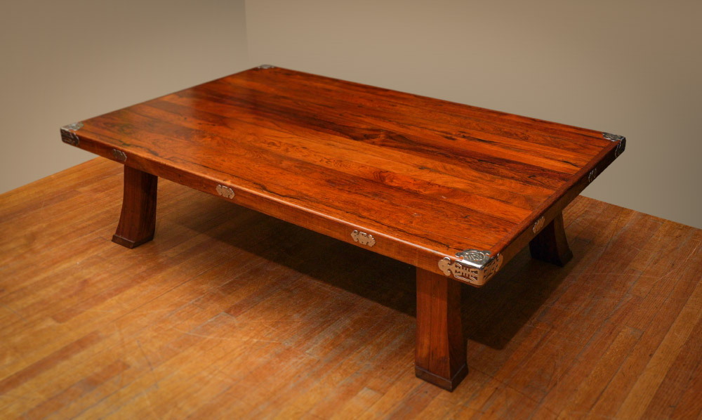 Appraisal: VIETNAMESE ROSEWOOD LOW EATING TABLE Panels of richly grained rosewood