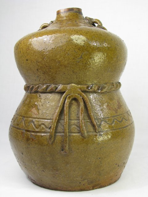 Appraisal: th century Korean glazed ceramic sake bottle No stopper Measures