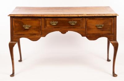 Appraisal: A walnut side table fitted three drawers on cabriole legs