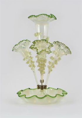 Appraisal: A glass pergne the central and three outer trumpets all