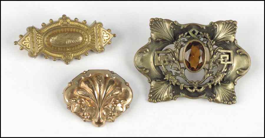 Appraisal: THRE VICTORIAN GOLD FILLED BROOCHES Condition No Specific Condition Recorded