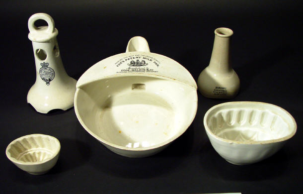 Appraisal: Five pottery kitchenalia items including a Fox's patent milkpan two