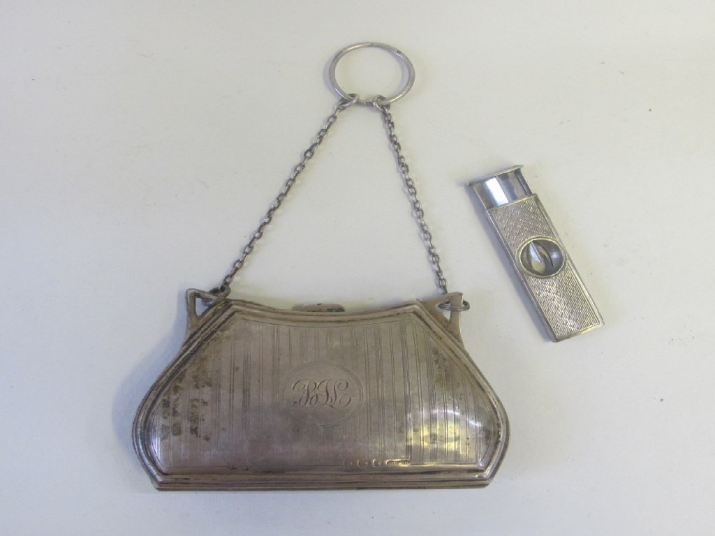 Appraisal: Lot comprising silver purse and silver cigar cutter Birmingham marks