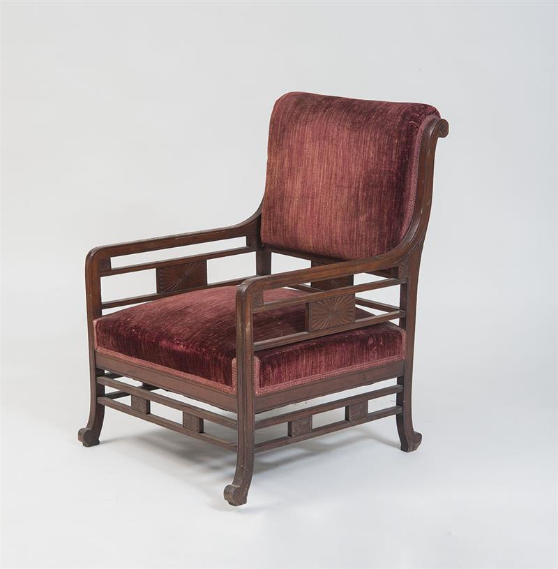 Appraisal: AESTHETIC MOVEMENT CARVED CHERRY ARMCHAIR Lacking casters x x in