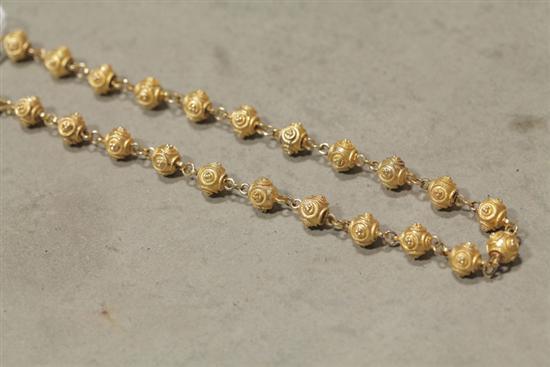 Appraisal: GOLD NECKLACE Ornate beads with wire decoration Clasp marked ''