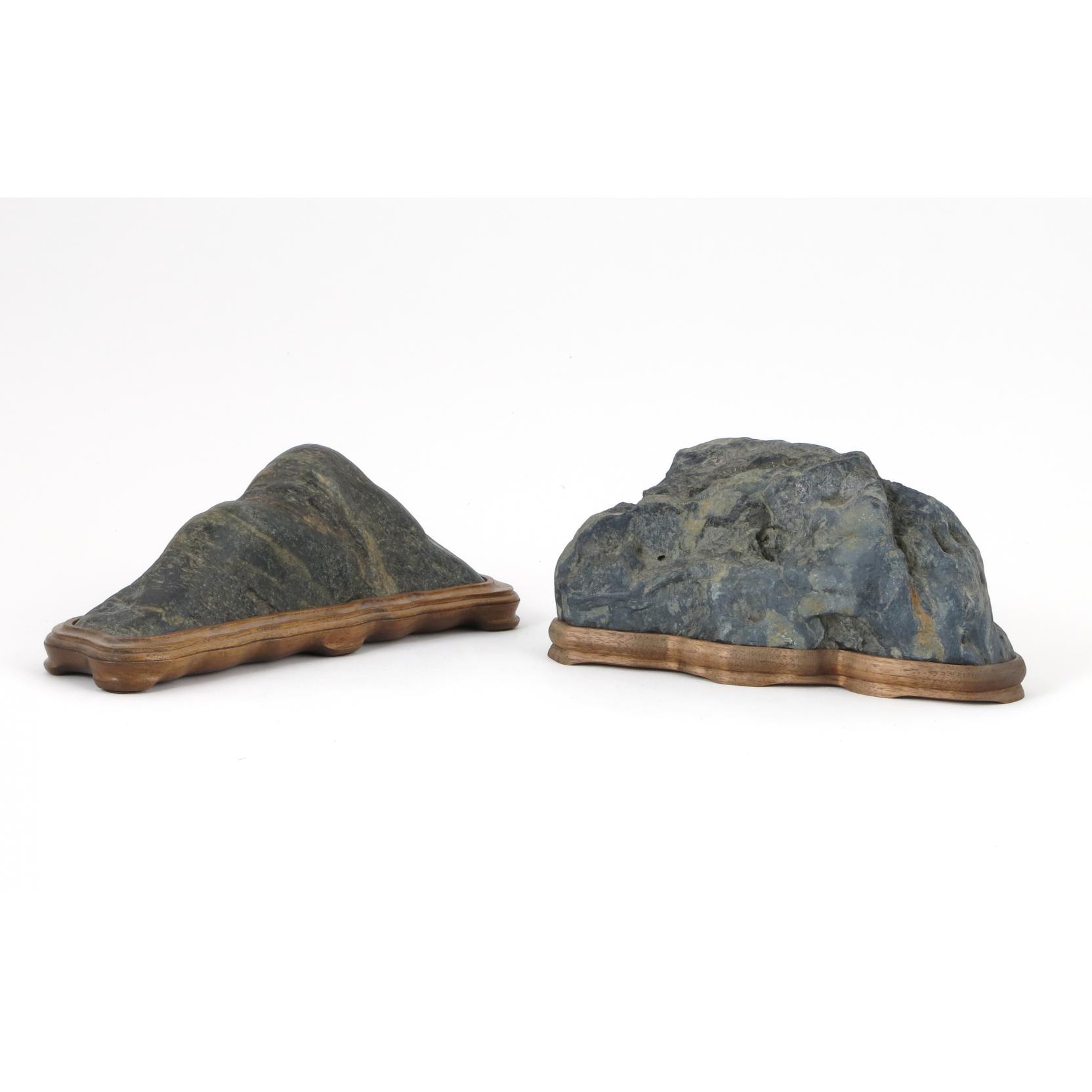 Appraisal: Two Asian Viewing Stones each on fitted hardwood stand larger