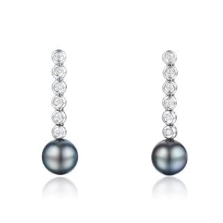 Appraisal: A Pair of Pearl and Diamond Earrings Each earring featuring